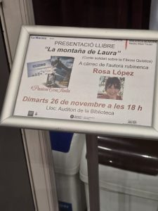 Cartell imprès amb informació de presentació del conte “La Montaña de Laura”
